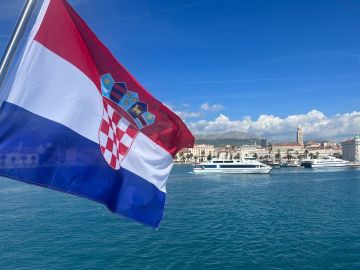 Waterfront promenade in Split with Diocletian’s Palace in background